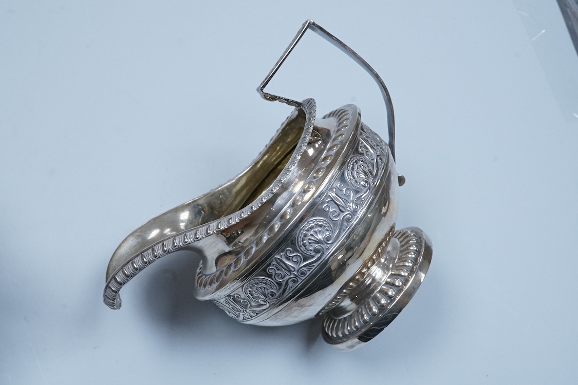 A George III Scottish silver two handled sugar bowl and matching cream jug, Robert Gray & Son, Edinburgh, 1814, sugar bowl height including handles, 11.5cm, 22.8oz.
